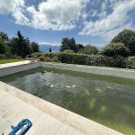 Habiller une piscine béton en inox